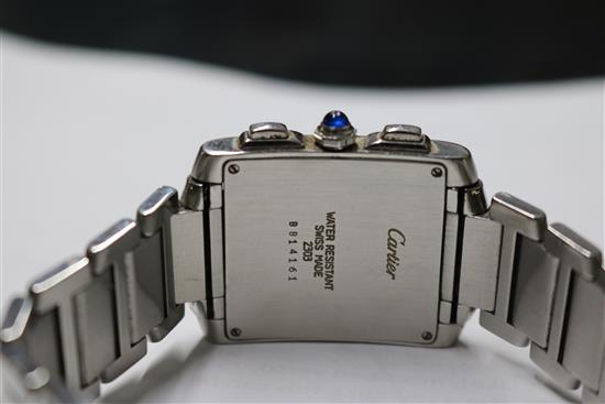 A gentlemans stainless steel Cartier Tank chronograph quartz wrist watch, with Cartier pouch, no box or paperwork.